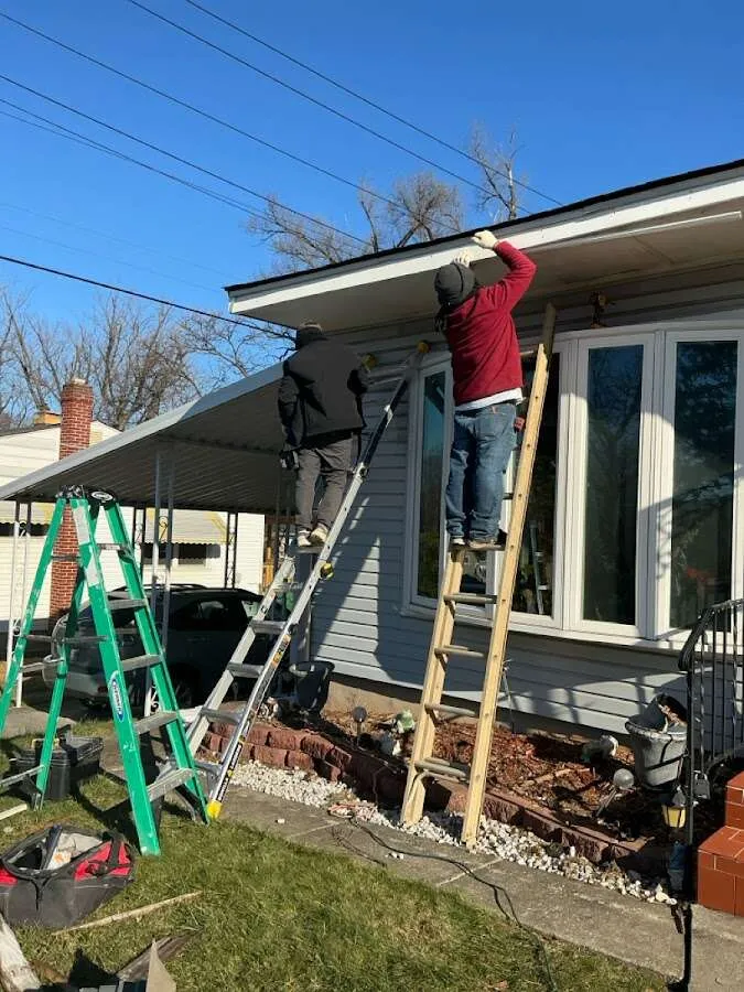 Restoration crew performing exterior repair in Farmington Hills
